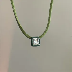 Stylish green PU leather choker necklace featuring a square crystal pendant for daily wear.