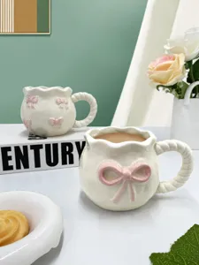 Tasse à café en céramique style ins avec nœud rose 3D et poignée pour le thé de l'après-midi.