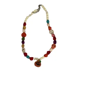 Halloween kraal ketting met kleurrijke schedel kralen en pompoen hanger voor dames mode sieraden.