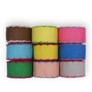 Colorful grosgrain ribbon with scalloped edge for DIY bow accessories and handmade crafts.