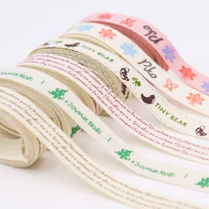 Cotton linen printed ribbon rolls for DIY hair accessories and gift wrapping crafts.