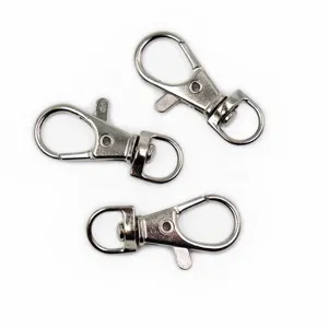 Metal swivel lobster clasps for DIY keychains, bag charms and straps. Detail hardware view.