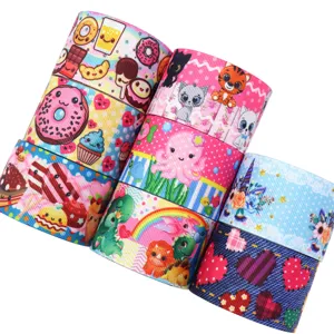 Detailed closeup of 38mm cartoon printed grosgrain ribbon rolls for DIY handmade hair bow accessories.