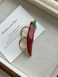 Chic enamel red chili double finger ring, stylish dopamine style statement jewelry piece.