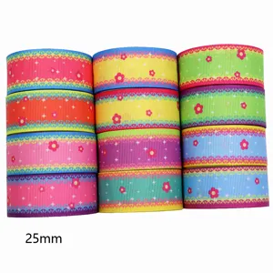Kleurrijke bedrukte ripslint rollen 25mm breedte voor DIY handwerk en accessoires.