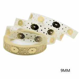 Gold-stamped sheer organza ribbon with lip pattern, 9mm width for gift wrapping and hair bows.
