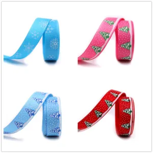 16mm Christmas ribbon with trees and snowflakes, perfect for holiday gift wrapping and crafts.