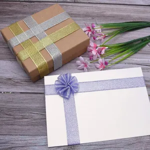 Gift box wrapping ribbon set with sparkling glitter finish for DIY crafts and decor.