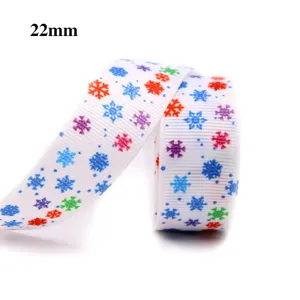 Ruban gros-grain de Noël de 22mm avec imprimé flocon de neige coloré pour emballage cadeau.
