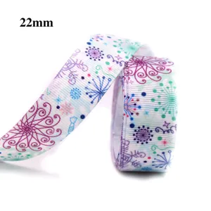 Ruban de Noël de 22mm avec motif de flocons colorés pour emballage cadeau et loisirs créatifs.