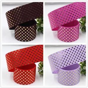 38mm gold polka dot grosgrain ribbon for hair bows, gift wrapping and holiday crafts.