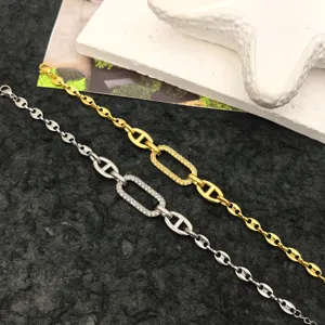 Minimalist stainless steel anchor chain bracelet set with sparkling zircon rectangular charms.
