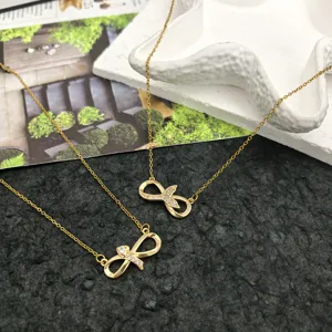 Exquisite infinity loop zircon titanium steel necklace, elegant clavicle chain for women.
