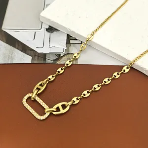 Exquisite stainless steel zircon necklace detail, minimalist gold chain design for women.
