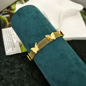Bracciale in maglia farfalla dorata da donna, gioiello da polso alla moda in acciaio.