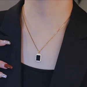 Elegant black square cubic zirconia pendant necklace with delicate gold chain fashion jewelry.