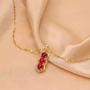 Exquisite rose gold titanium steel peanut pendant necklace with sparkling micro-paved zirconia.