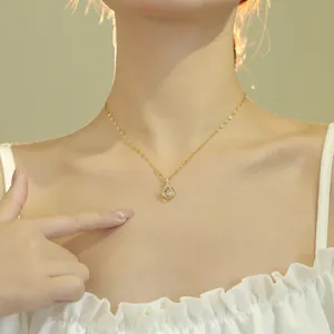 Elegant gold titanium steel clavicle chain necklace with chic delicate pendant for women daily wear.