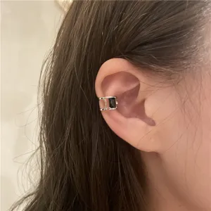 Minimalist C-shaped ear cuff with dark zircon for non-pierced ears, elegant daily fashion jewelry.
