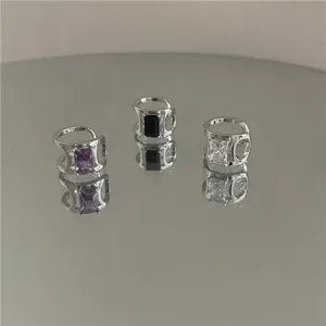 French minimalist C-shaped ear cuffs with rectangular zircon stones, elegant clip-on design.
