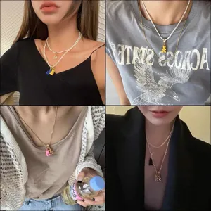 Dulce collar de perlas multicapa con colgantes de ositos de goma para moda de mujer.