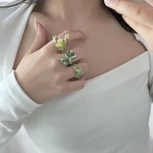Handmade green raw stone beaded ring with unique lava open metal design for women fashion.