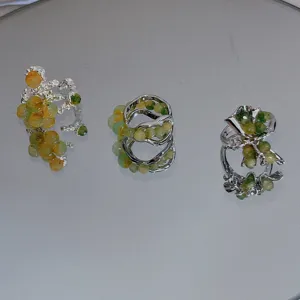 Handmade green raw stone beaded rings with unique molten silver design for women chic jewelry detail