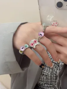 Chunky silver rings set with cute monster cat eye design, cool trendy open rings for women