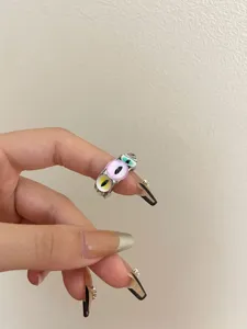 Close up view of the unique stackable cat eye monster ring showing exquisite jewelry details.