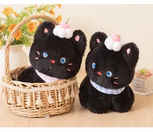 Cute cartoon black cat plush toy with cream cherry and checkered bib fluffy doll.