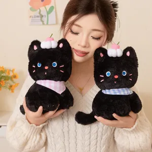 Cute black cat plush toy with cream decor and checkered kerchief, soft hugging doll for kids.
