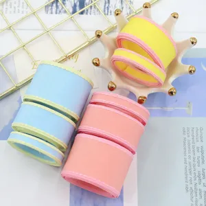 Κορδέλες με χρώματα για DIY φιόγκους μαλλιών, αξεσουάρ ένδυσης και συσκευασία δώρου.
