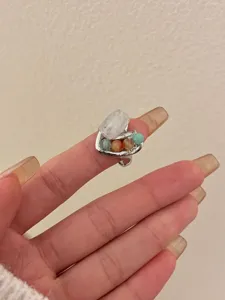 Handmade crystal beaded open ring detail shot showing colorful stone and silver metal band.
