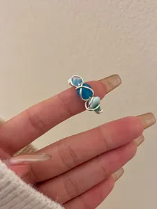 Handmade wire wrapped natural stone crystal beaded ring detail view, adjustable open finger ring.