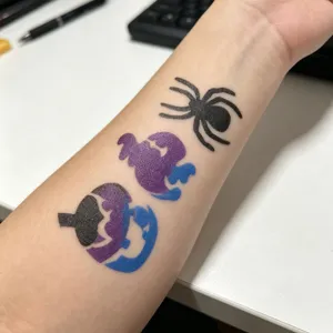 Halloween temporary tattoo sticker details, body painting stencil pattern on arm display.