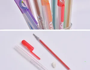 Glitter scented gel pen refill and disassembled components detail close up view stationery