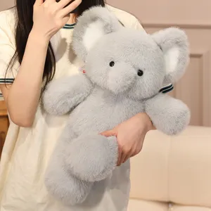 Grey plush elephant stuffed animal toy, soft cute fluffy companion for kids and home decor.