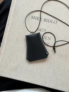 Black leather glasses holder necklace with lanyard, stylish portable sun glasses storage pouch pendant.