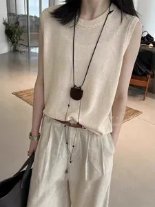 Detail view of stylish leather glasses clip necklace with magnetic closure for outdoor travel.