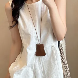 Leather sunglasses holder necklace for women, stylish neck lanyard pouch for outdoor travel use.