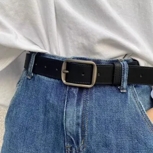 Minimalist black leather belt with metal square pin buckle, detailed close-up view for daily wear.