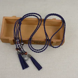 Ethnic handmade braided waist rope belt with tassels and beads for women fashion dress accessory.