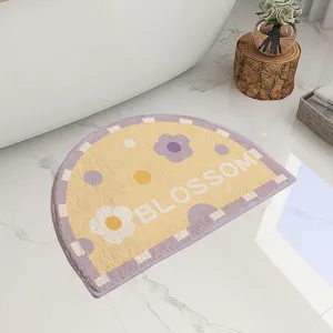Half-circle absorbent bathroom floor mat, non-slip cute floral carpet for home washroom.