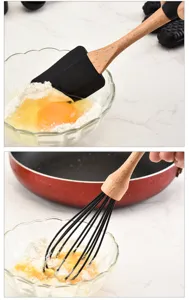 Ensemble de spatule et fouet de pâtisserie en silicone avec manche en bois pour cuisine.