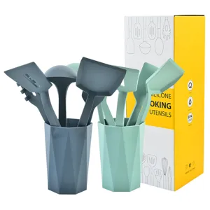Silicone cooking utensils set with holder, heat resistant kitchen spatula and spoon tools.