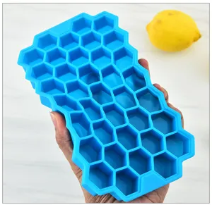 Flexible blue silicone honeycomb ice cube tray detail view showing grid structure and quality.