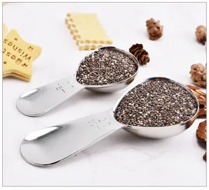 Stainless steel measuring spoon set with clear volume markings for baking, coffee, and cooking.