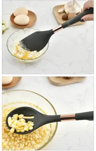 Silicone kitchen utensil detail showing heat-resistant spatula and slotted spoon in use.