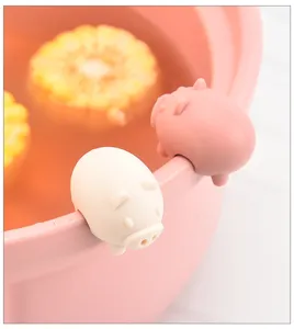Cute pig silicone pot lid clips anti overflow kitchen boiling soup cooking accessories.
