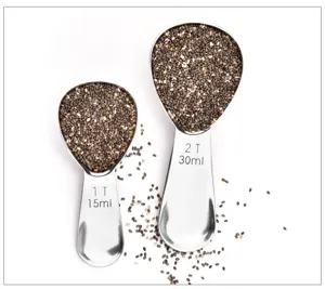 Stainless steel measuring spoons set of 2 with capacity markings for kitchen baking use.